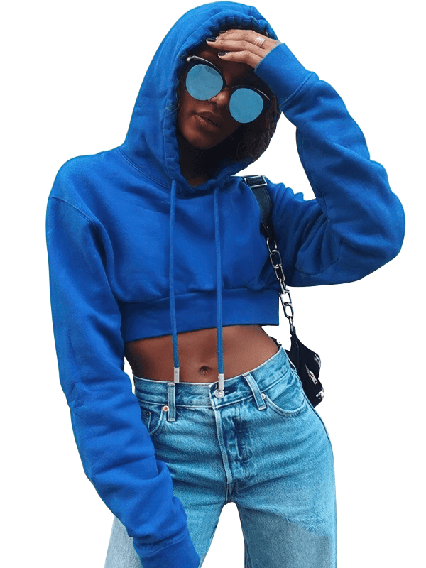 Blue cropped sports hoodie for women, perfect for yoga and workouts, with long sleeves and cuffed design, worn with jeans and sunglasses.